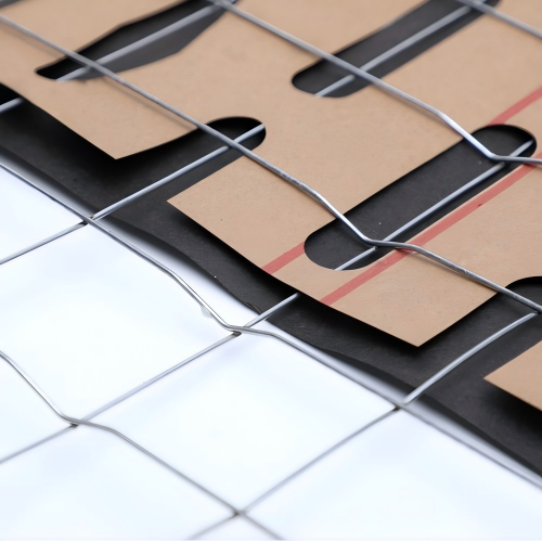 Paper backed rib lath for exterior stucco and plaster applications